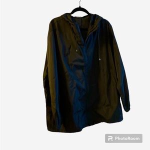 Packable Rain jacket/windbreaker in black. Size 22W. In’Voland is the brand.
